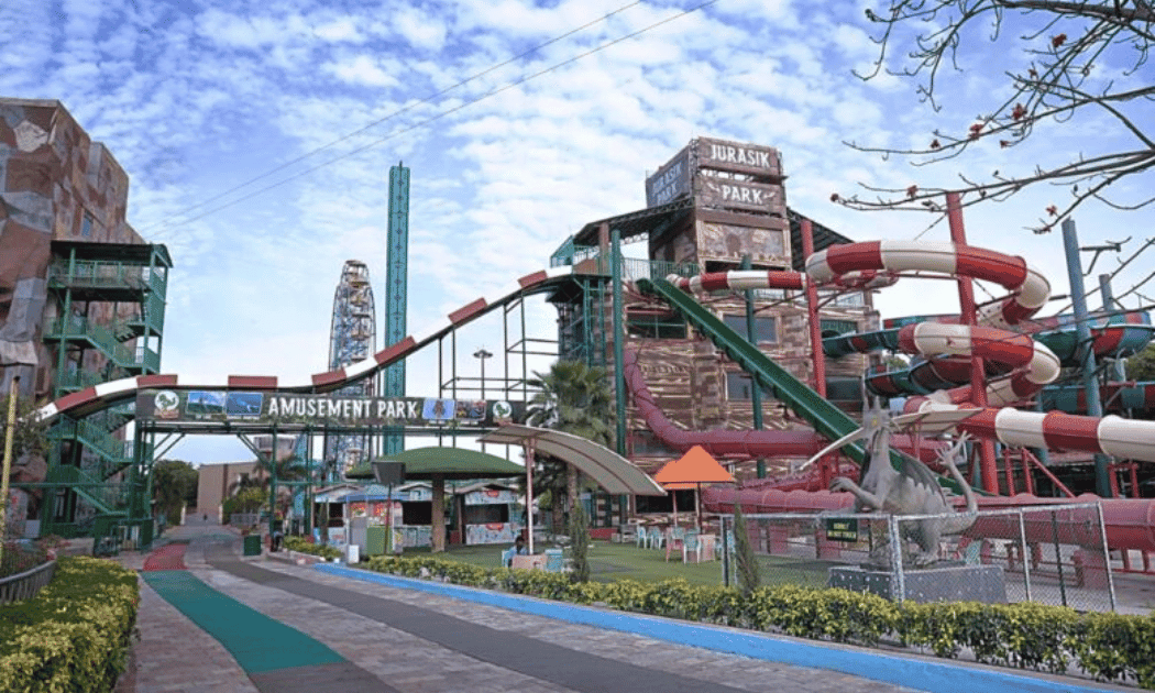 Family enjoying a theme park ride Family enjoying a theme park ride
